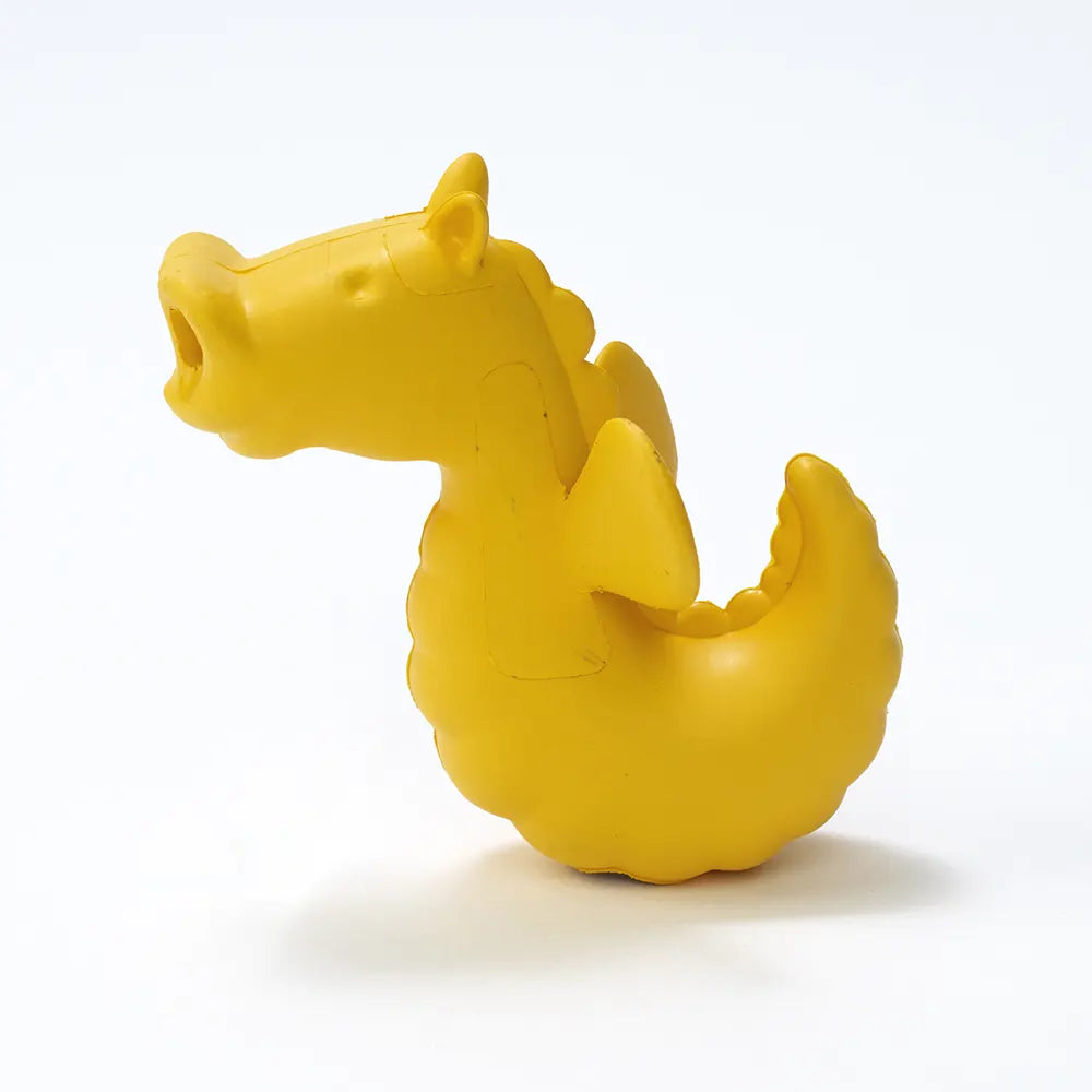 Yellow rubber seahorse bath toy.