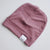 Ribbed knit baby and kids beanie hat in rose colour.