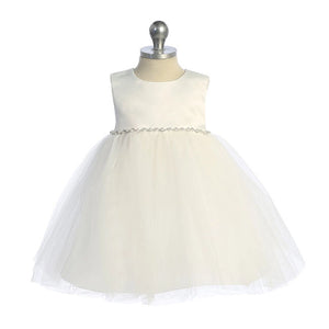 Infant special occasion dress with satin top. Sleeveless with tulle ballroom skirt. Rhinestone and pearl detail at waist. Ivory
