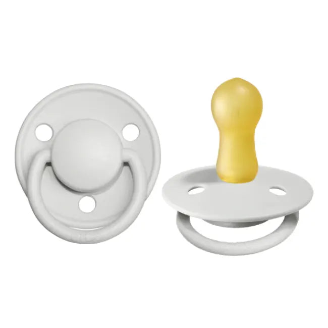 2pk of haze grey pacifiers with round natural latex nipple and haze handle.