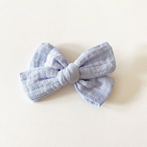 Bohemian Babies. Light blue muslin bow on an alligator hair clip. Color Periwinkle