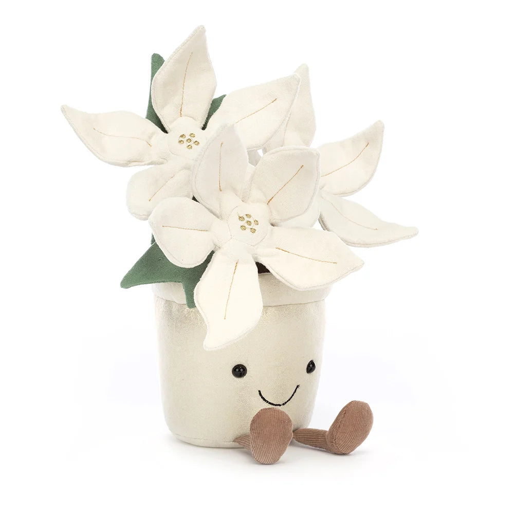 Plush cream and gold poinsettia plant with brown corduroy feet and smiling face.