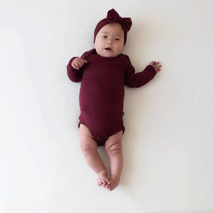 Kyte Baby Long Sleeve Bodysuit in Burgundy