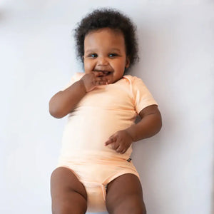 Kyte Baby Short Sleeve Bodysuit in Canyon