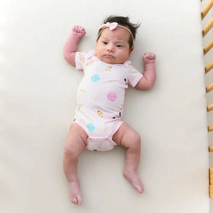Kyte Baby Short Sleeve Bodysuit in Sakura Space