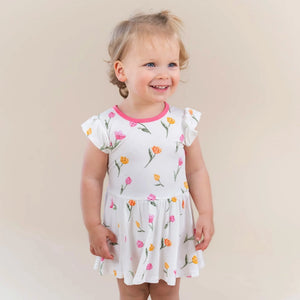 Kyte Baby Twirl Bodysuit Dress in Tulip