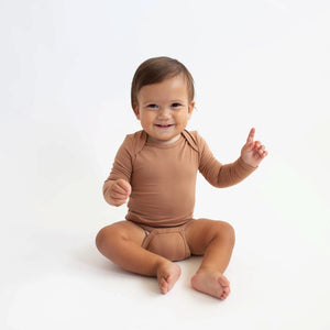 Kyte Baby Long Sleeve Bodysuit in Latte