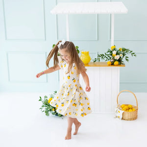 Kyte Baby Short Sleeve Printed Pocket Dress in Lemon