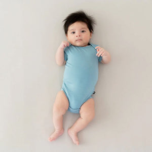 Kyte Baby Short Sleeve Bodysuit in Dusty Blue