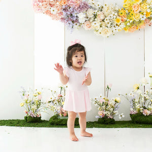Kyte Baby Twirl Bodysuit Dress in Sakura