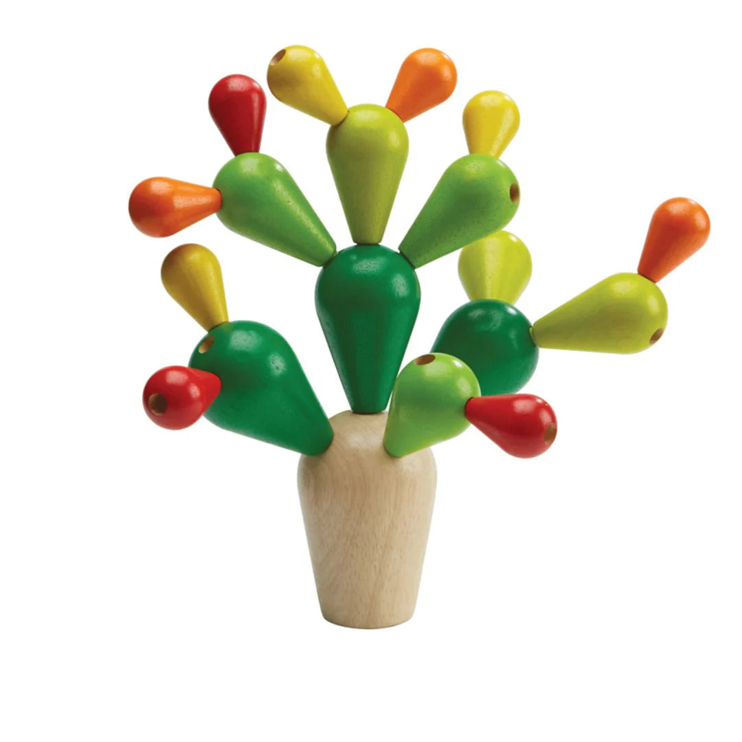 Colorful wooden balancing game in the shape of a cactus on a white background