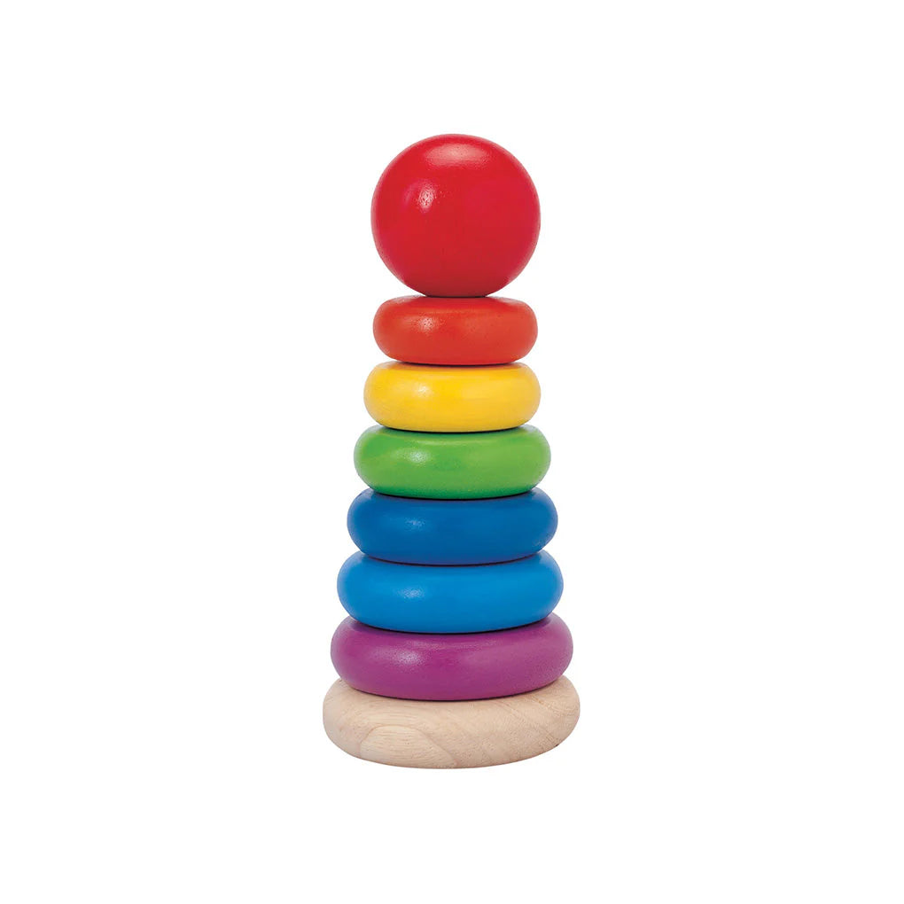 Colorful wooden stacking toy on a white background