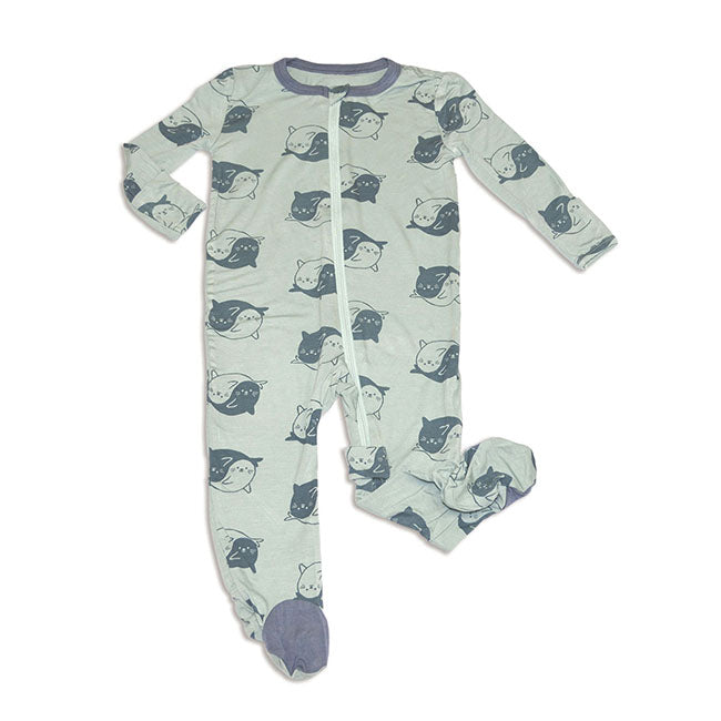 sage green zippered footie with baby seals in a yin yang pattern