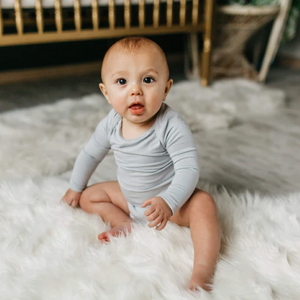 Kyte Baby Long Sleeve Bodysuit in Storm