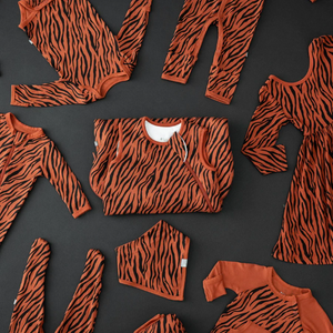 kyte baby bow printed in rust tiger